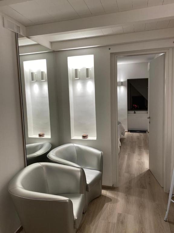 Posezení v ubytování Visavi' Luxury Room