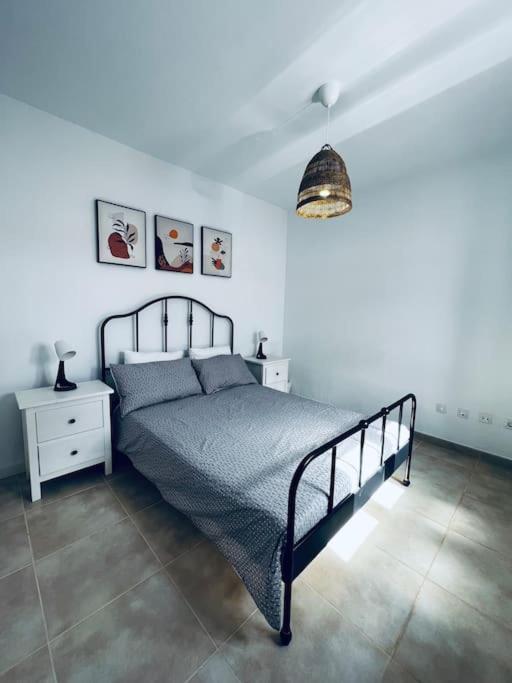 A bed or beds in a room at Lovely Casa Sueños, heated pool x snooker table