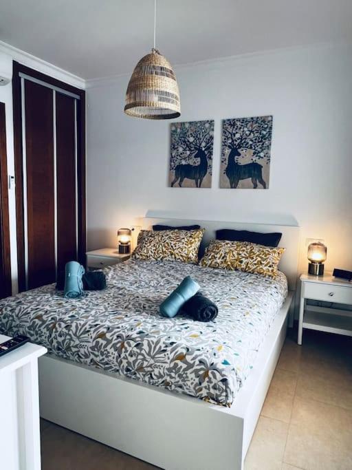A bed or beds in a room at Lovely Casa Sueños, heated pool x snooker table
