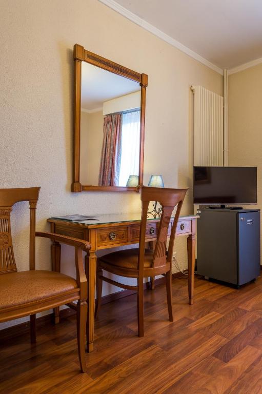 TV a/nebo společenská místnost v ubytování Hotel Diplomate