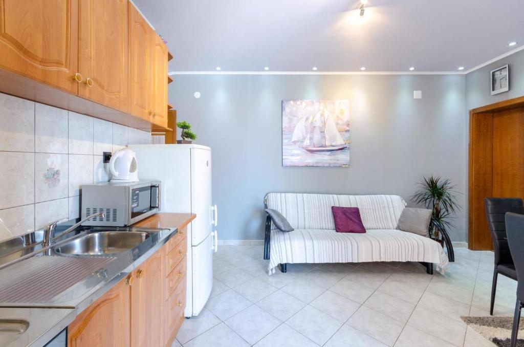 Kuchyň nebo kuchyňský kout v ubytování Apartment in Crikvenica 27606