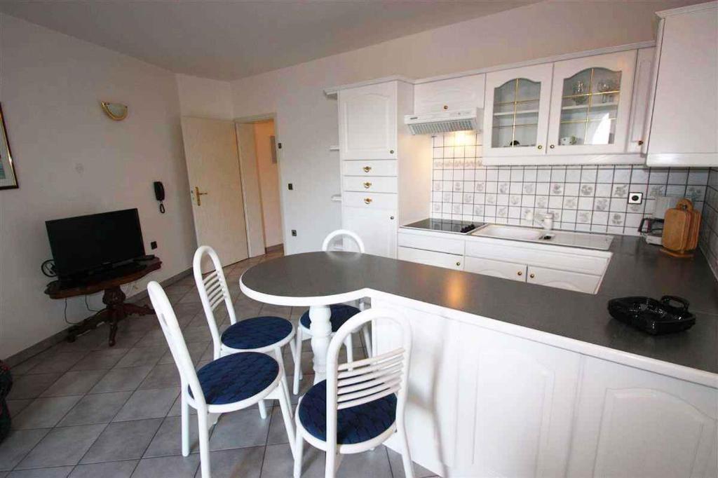 Kuchyňa alebo kuchynka v ubytovaní Apartments in Rabac 39139