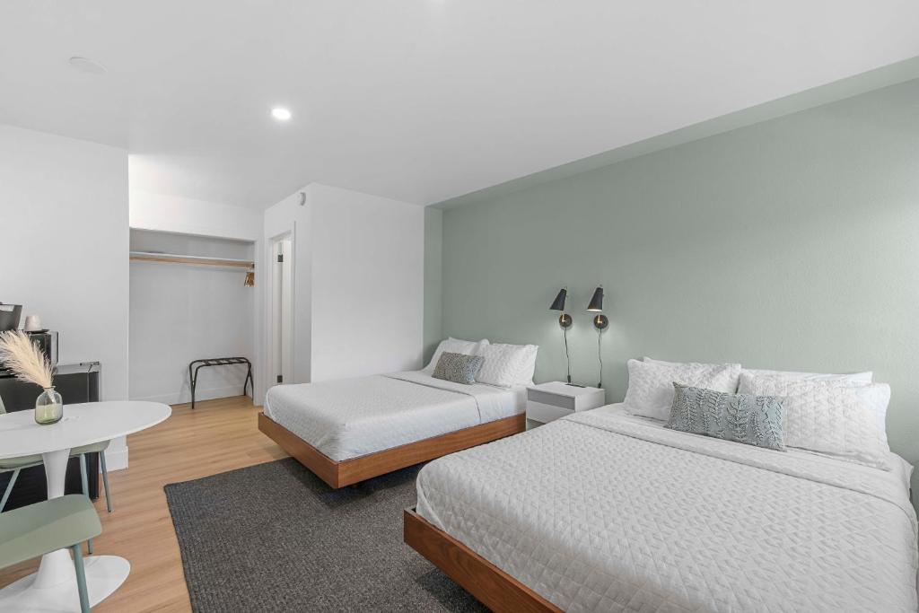 Postel nebo postele na pokoji v ubytování Cashmere Inn