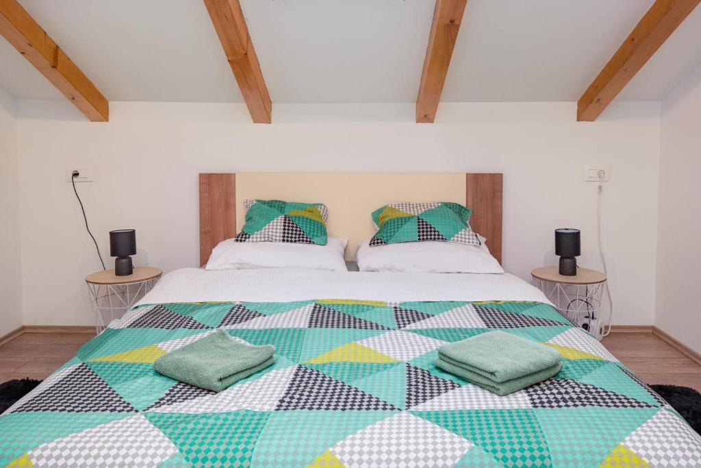 Ένα ή περισσότερα κρεβάτια σε δωμάτιο στο Vale Mare Apartment