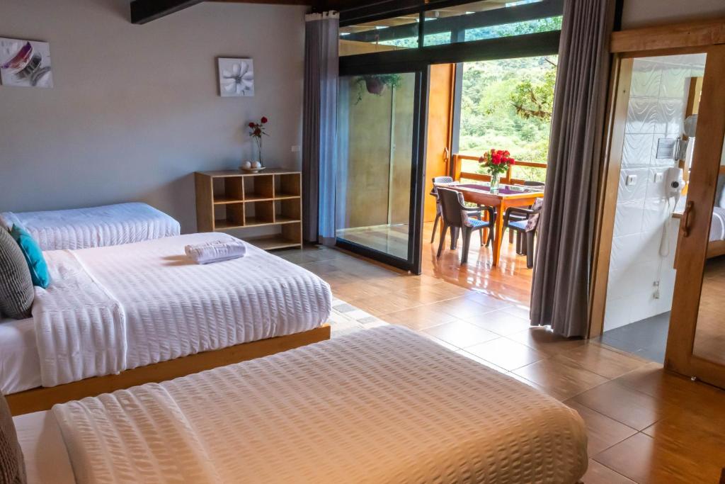 Postel nebo postele na pokoji v ubytování Las Terrazas de Dana Boutique Lodge & Spa
