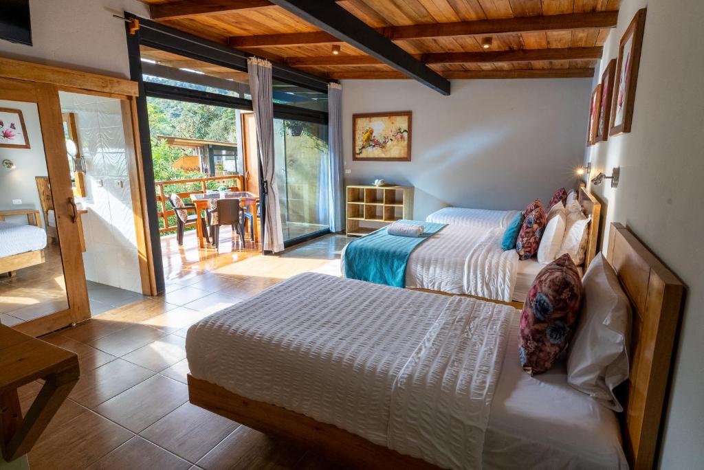Postel nebo postele na pokoji v ubytování Las Terrazas de Dana Boutique Lodge & Spa
