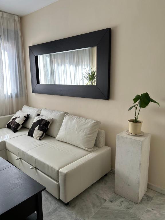 Posezení v ubytování ATICO TRIANA CON PISCINA PRIVADA