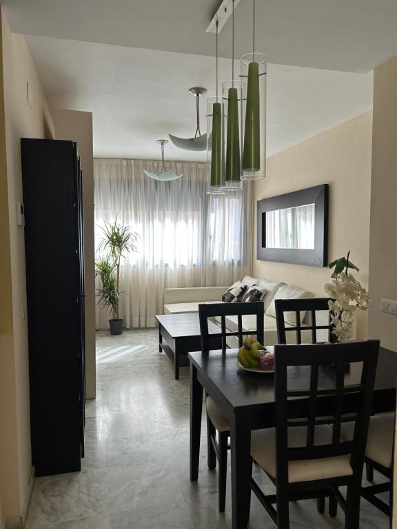 Posezení v ubytování ATICO TRIANA CON PISCINA PRIVADA
