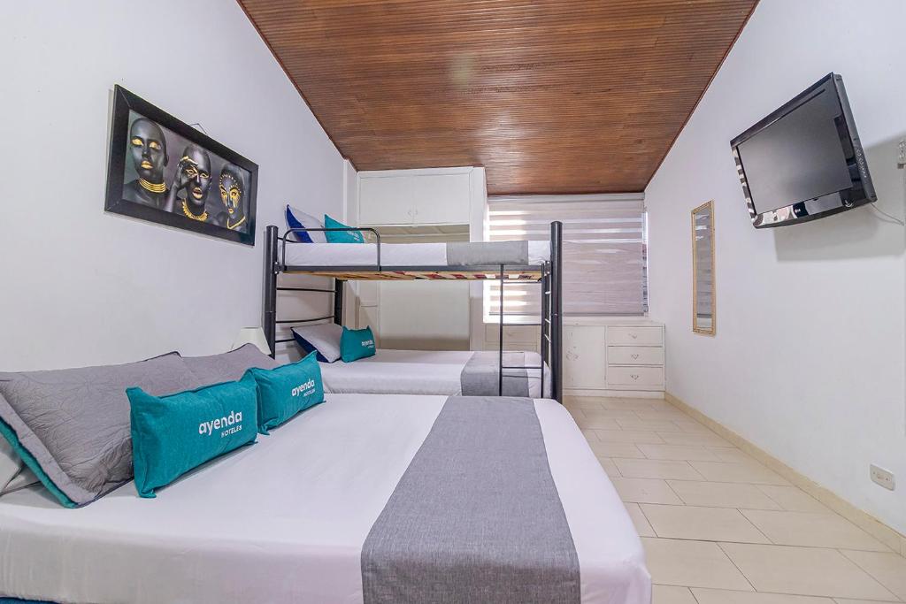 Ayenda Hostal El Tocororo - Habitación Cuádruple Estándar