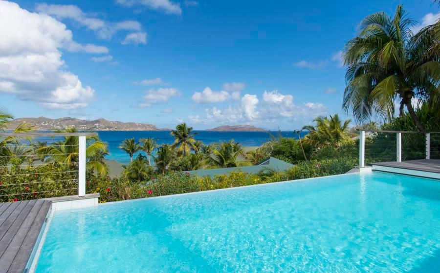 a swimming pool with a view of the ocean at Alize D'Eden in Saint Barthelemy