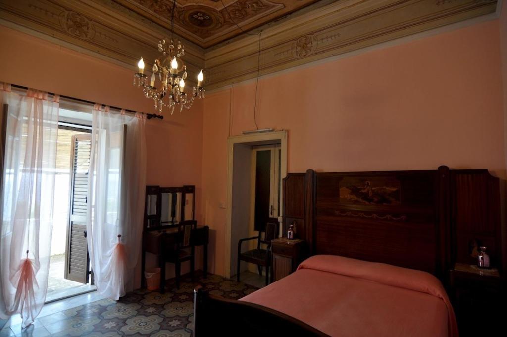 Postel nebo postele na pokoji v ubytování Mariangelica
