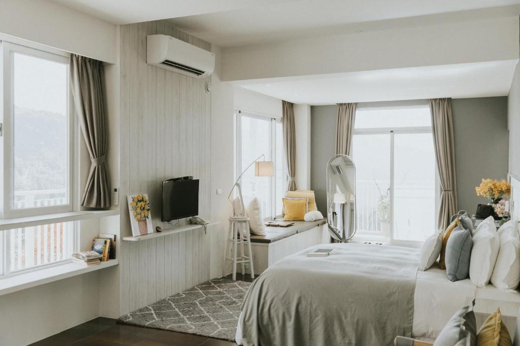 Voodi või voodid majutusasutuse Sunrise Yunqi Teahouse toas