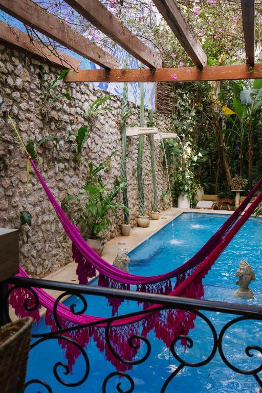 Bazén v ubytování Le Muuch Hotel Boutique nebo v jeho okolí