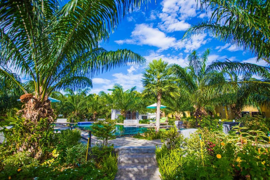 Zahrada ubytování Palm Pran Resort