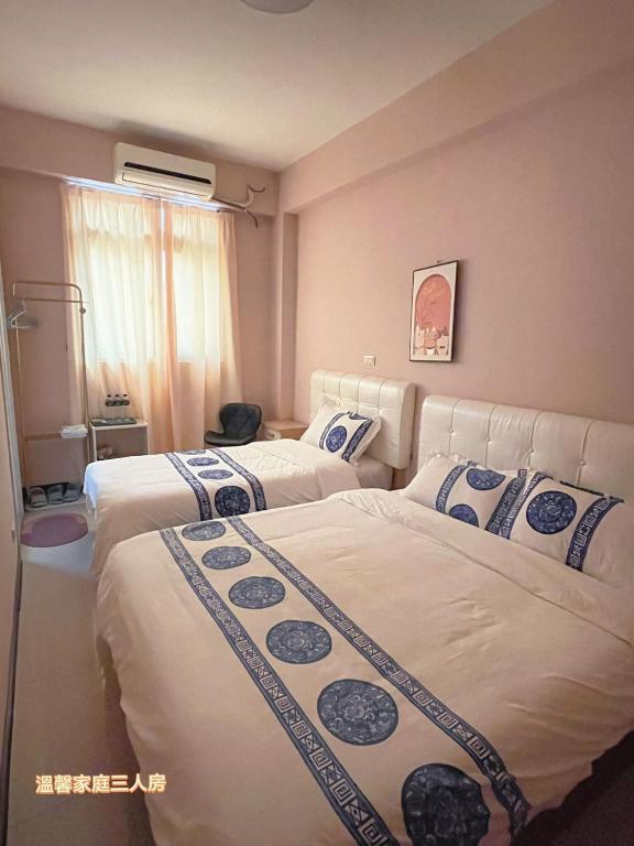 Postel nebo postele na pokoji v ubytování Dear B&B Building II