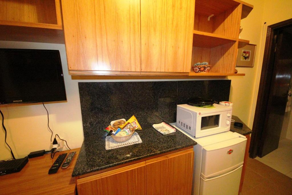 Kuchyň nebo kuchyňský kout v ubytování OKE Apart Hotel