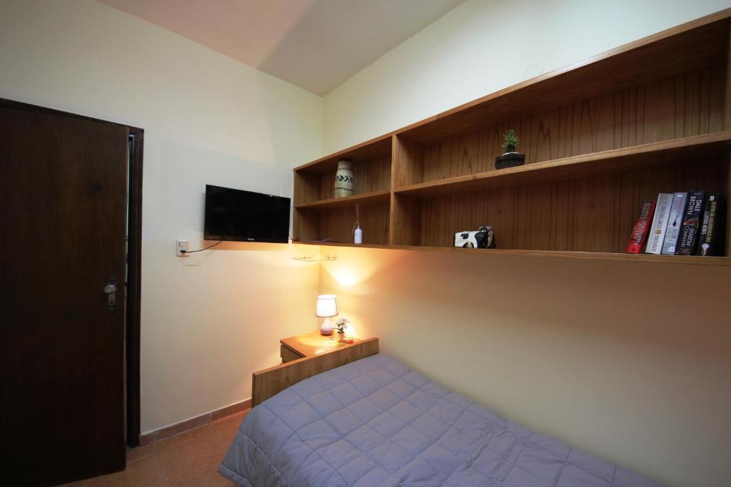 Postel nebo postele na pokoji v ubytování OKE Apart Hotel