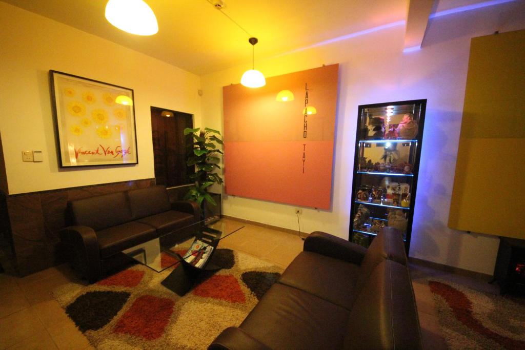 Posezení v ubytování OKE Apart Hotel