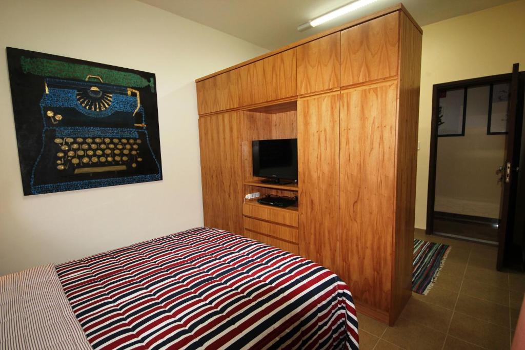 Postel nebo postele na pokoji v ubytování OKE Apart Hotel