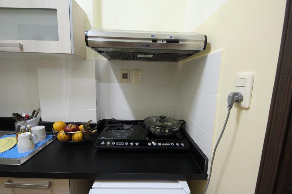 Kuchyň nebo kuchyňský kout v ubytování OKE Apart Hotel