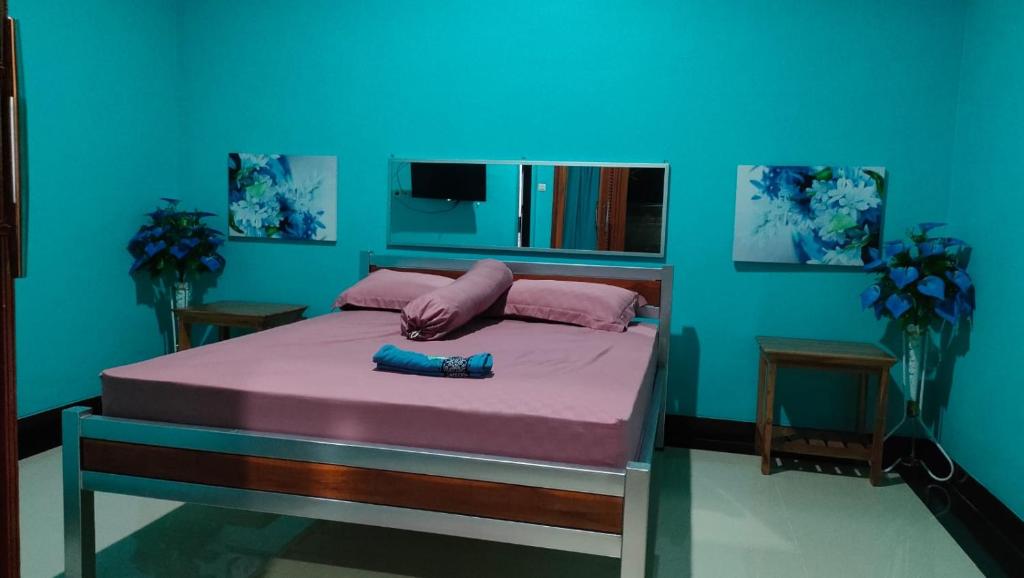 Postel nebo postele na pokoji v ubytování Jepun Bali hotel negara
