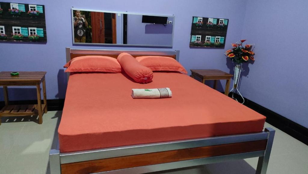 Postel nebo postele na pokoji v ubytování Jepun Bali hotel negara