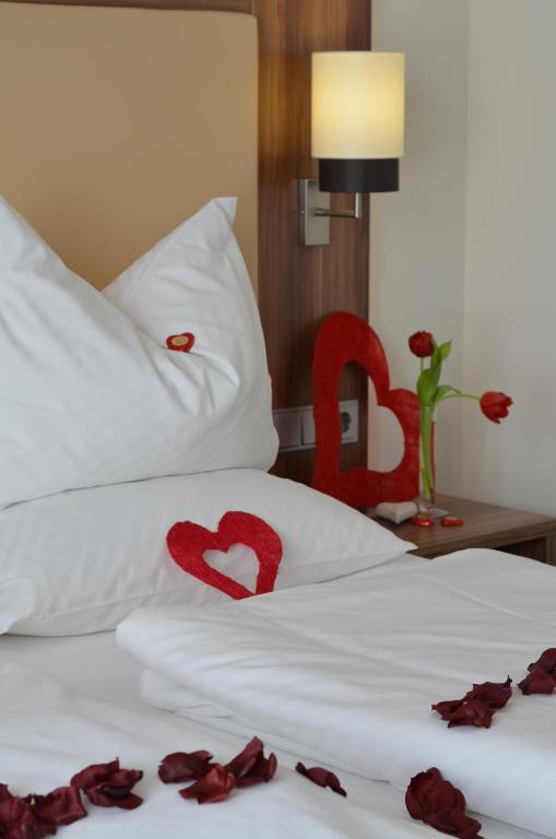 Postel nebo postele na pokoji v ubytování Wohlfühl-Hotel Neu Heidelberg