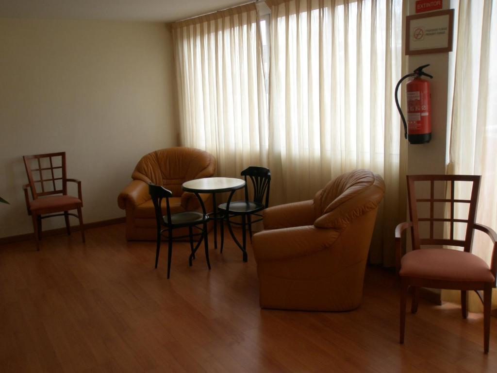 Posezení v ubytování Hotel Mayna
