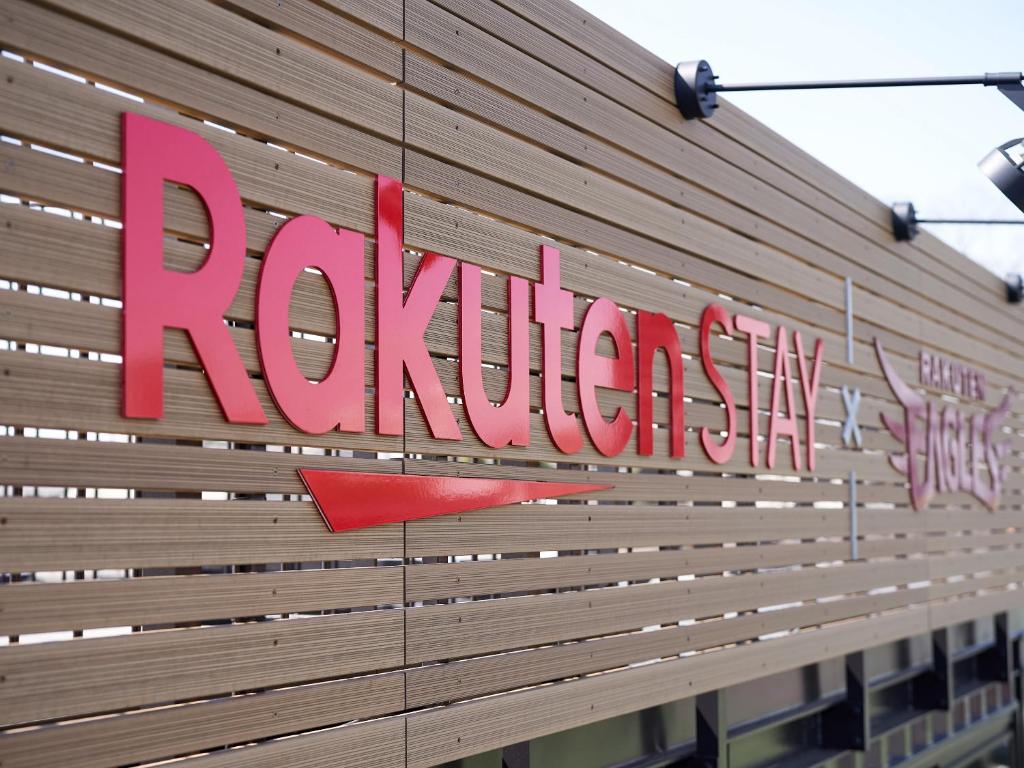 a sign on the side of a building at Rakuten STAY x EAGLES 202 with Roof balcony in Sendai