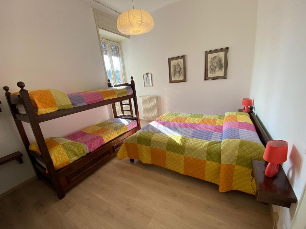 A bed or beds in a room at Gardenia