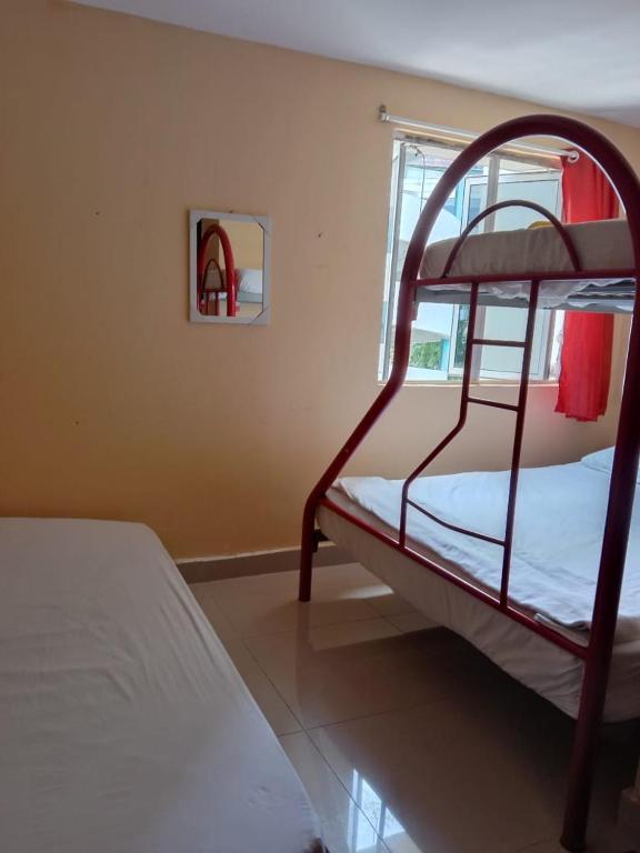Postel nebo postele na pokoji v ubytování RAS Hotel
