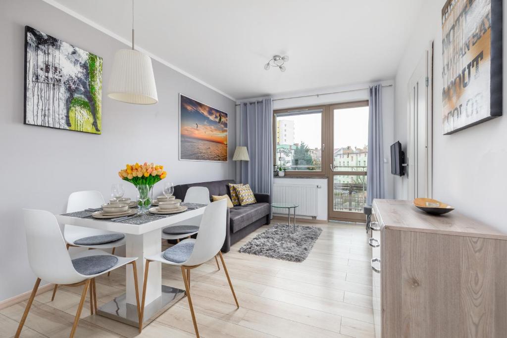 Posezení v ubytování Wind Rose Quarter Apartments by Noclegi Renters