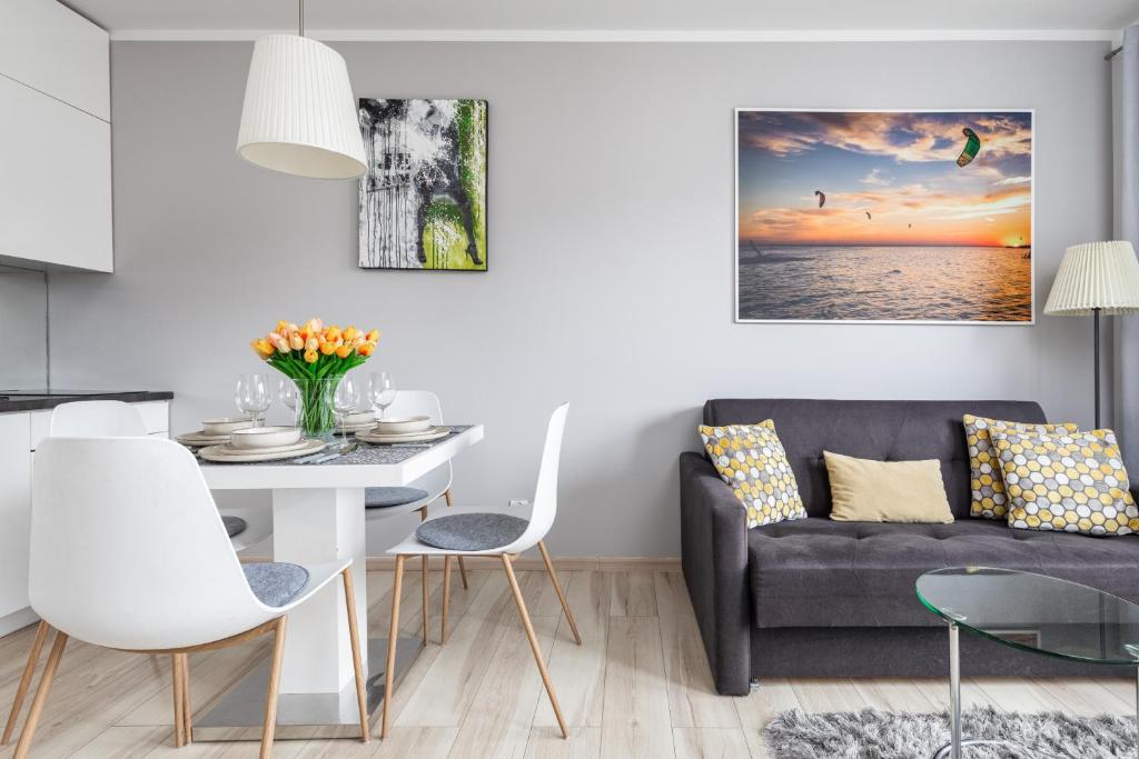 Posezení v ubytování Wind Rose Quarter Apartments by Noclegi Renters