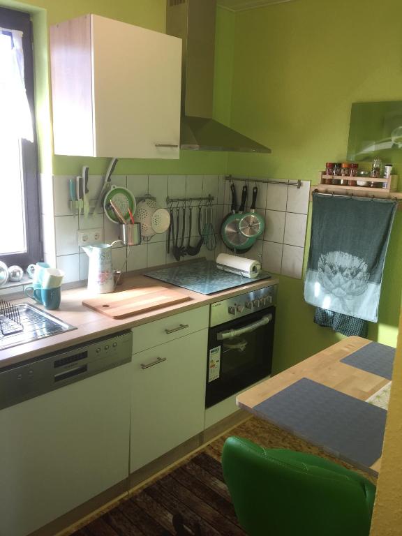 Kuchyň nebo kuchyňský kout v ubytování Sunshine Cottage