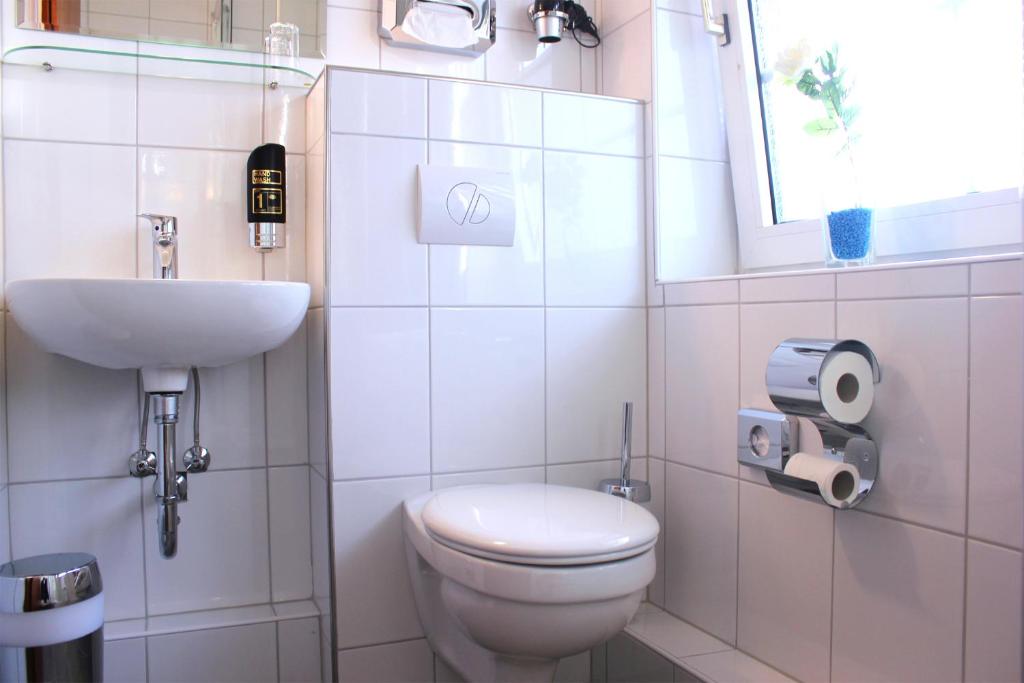 Koupelna v ubytování Hotel Altenwerder Hof