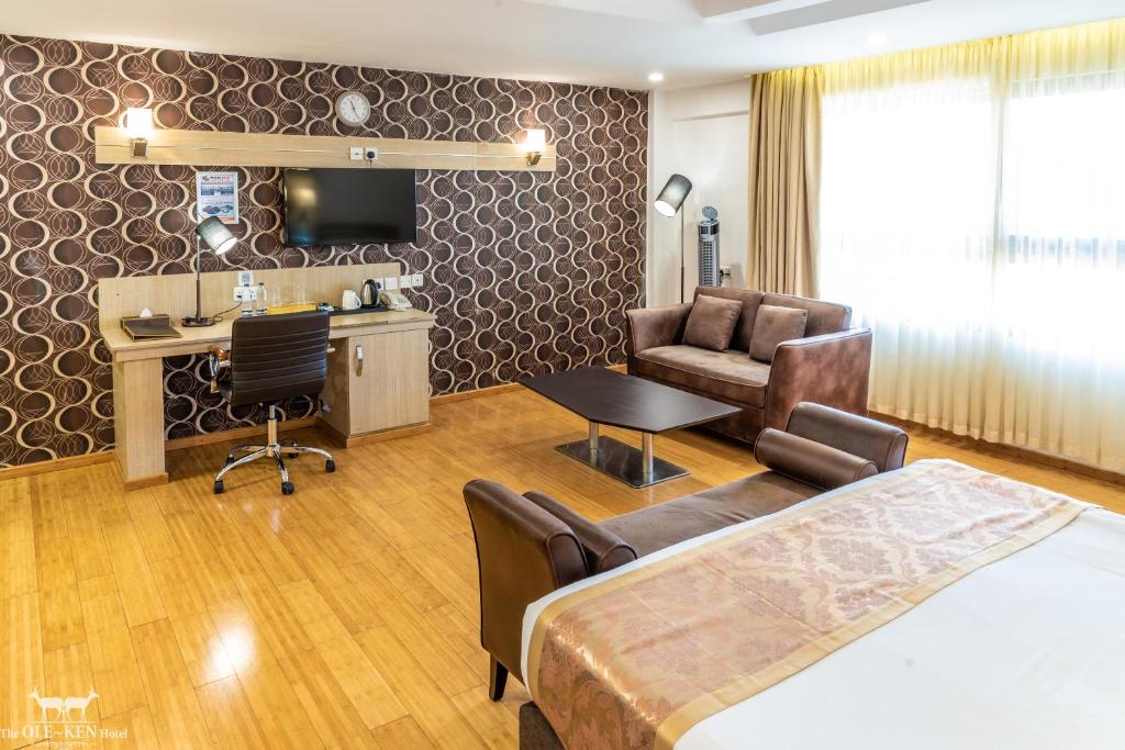 Kuchyň nebo kuchyňský kout v ubytování The Ole-Ken Hotel