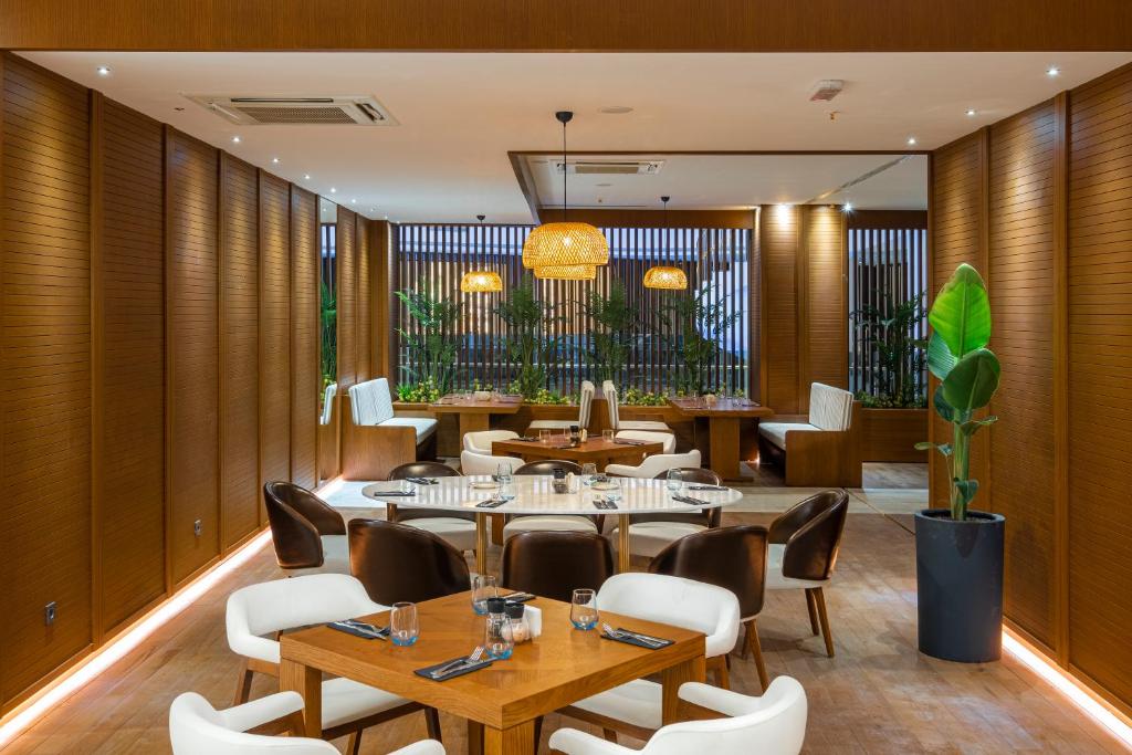 A seating area at Rubi Platinum Sign
