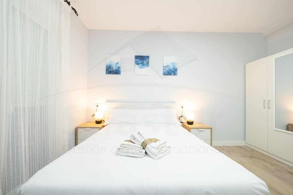 מיטה או מיטות בחדר ב-Cruz Victoria