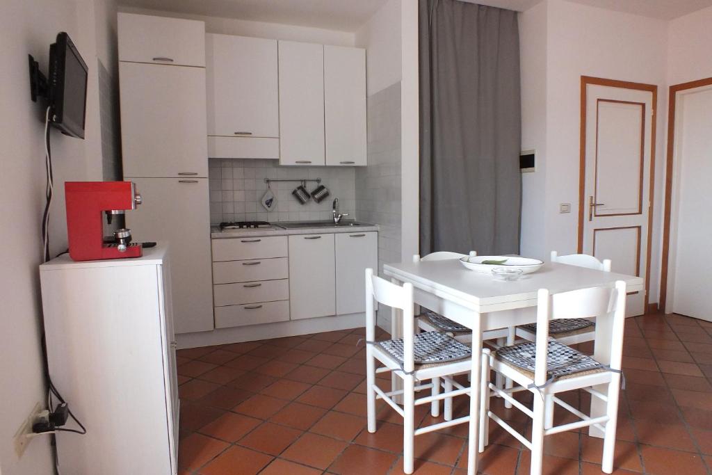 A kitchen or kitchenette at Le Soleil