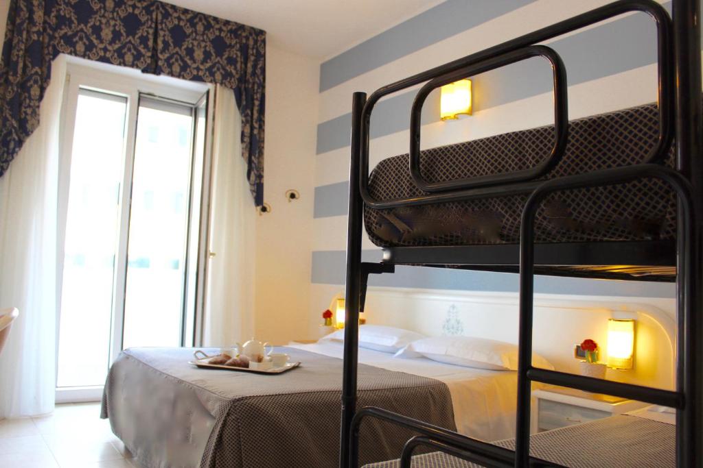 
Quadruple Room with Side Sea View
