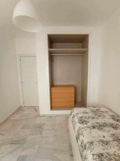 Posteľ alebo postele v izbe v ubytovaní 4 rooms pkg Marmoles Malaga