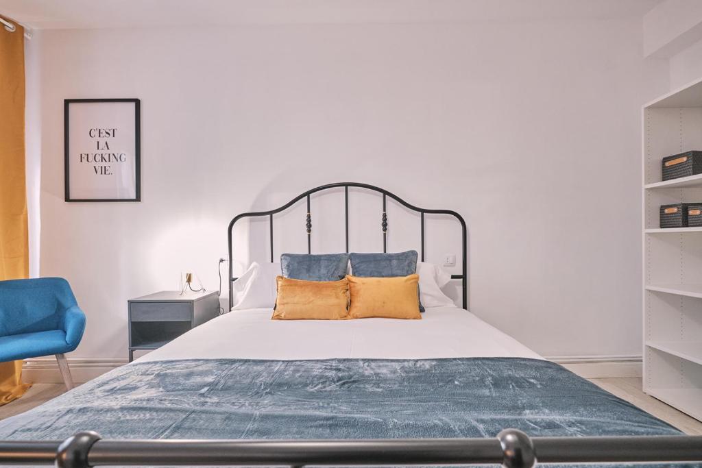 Postel nebo postele na pokoji v ubytování Dadá Coliving & Rooms by Serendipia Turismo