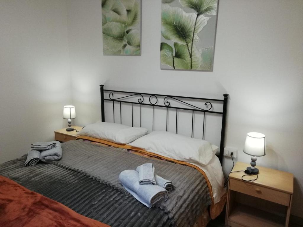 Ένα ή περισσότερα κρεβάτια σε δωμάτιο στο Casa Marina