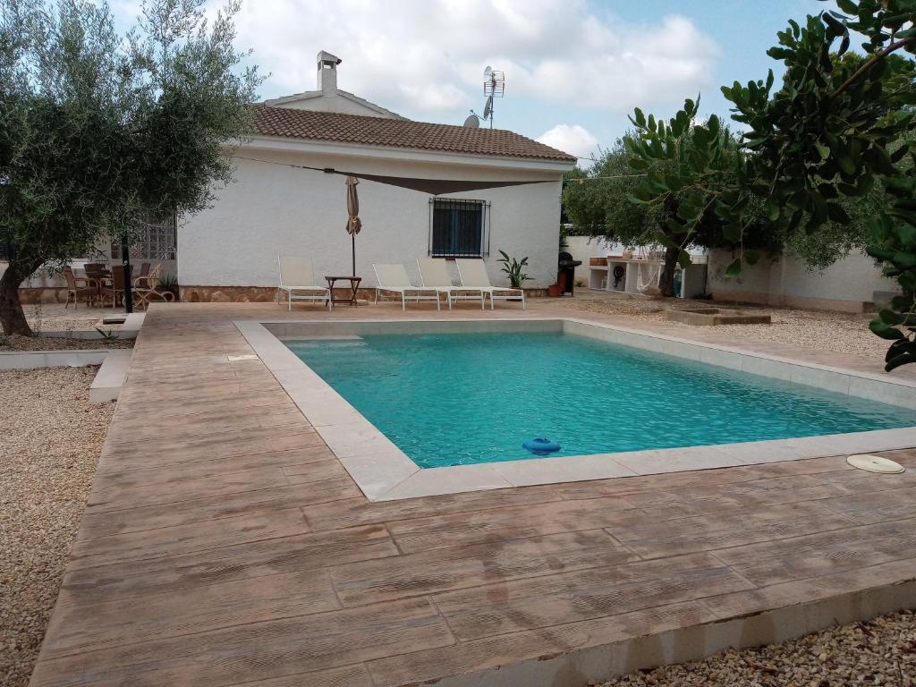The swimming pool at or close to Villa Tres Cales