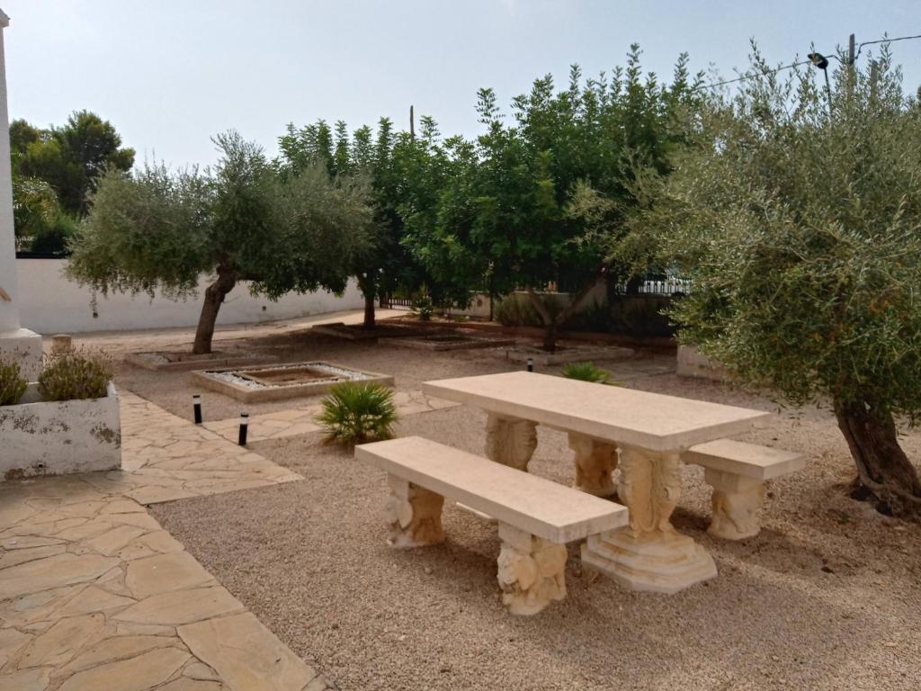 A garden outside Villa Tres Cales