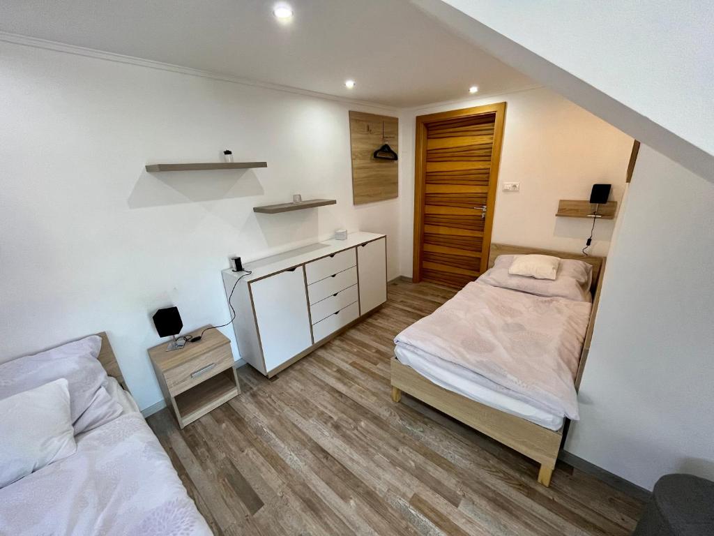 Posteľ alebo postele v izbe v ubytovaní Rabbit apartman