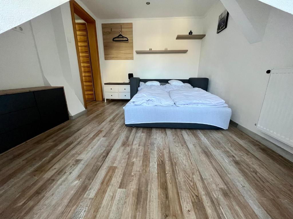 Posteľ alebo postele v izbe v ubytovaní Rabbit apartman