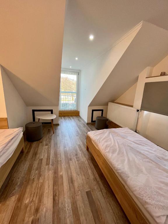 Posteľ alebo postele v izbe v ubytovaní Rabbit apartman