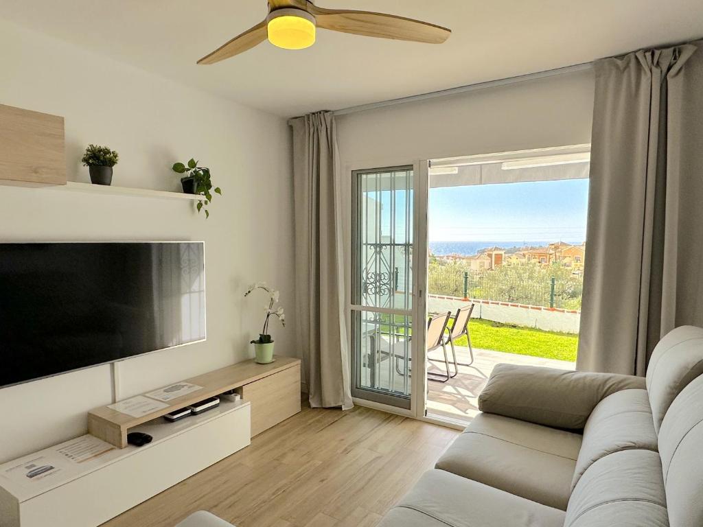 Televízia a/alebo spoločenská miestnosť v ubytovaní La Noria Sunny Stay Casasol