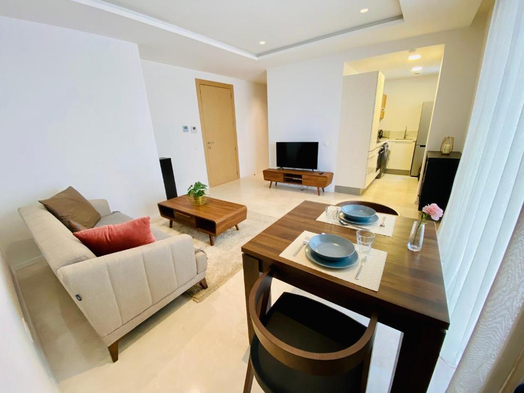 a living room with a couch and a table at La casa in Casablanca